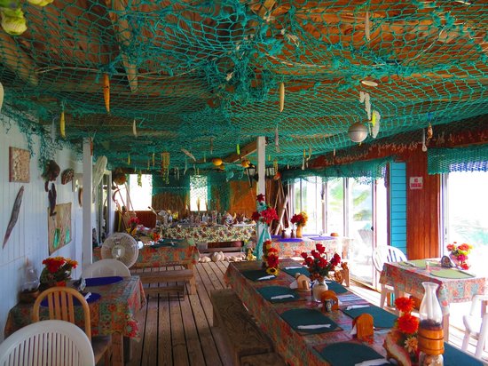 Decorar restaurante en la playa temática pescador